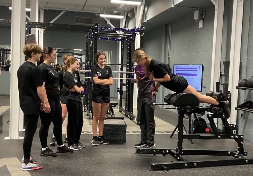 Students taking part in a strength and conditioning session.