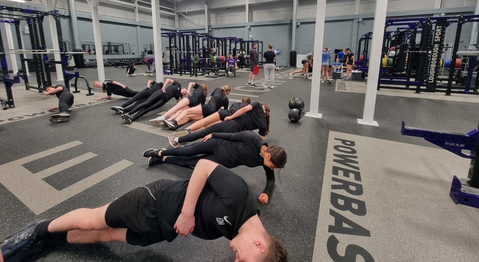 Image of students taking part in a strength and conditioning session.