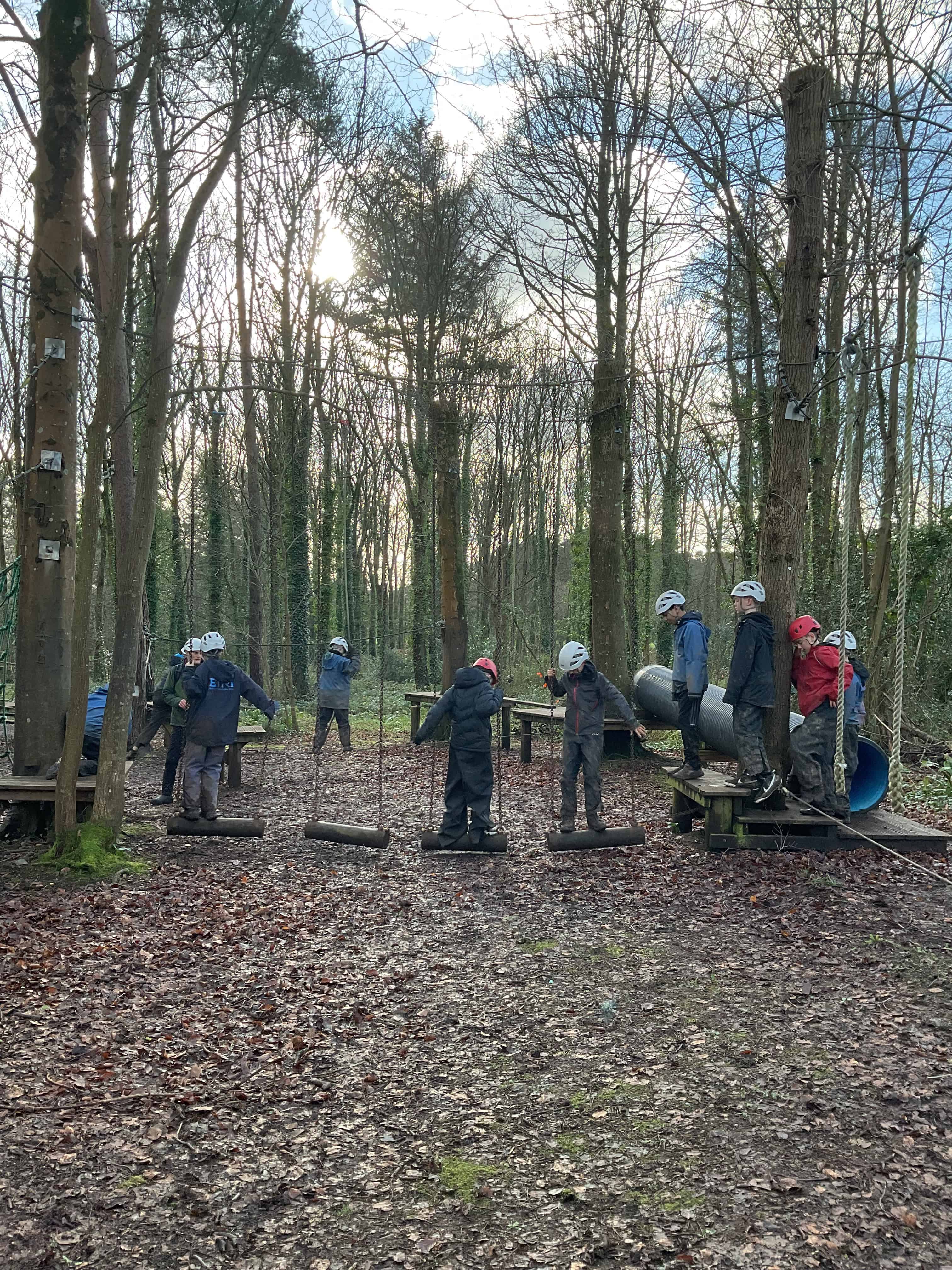 Students from Priestnall School take on a low ropes course at the Conway Centre in Anglesey.