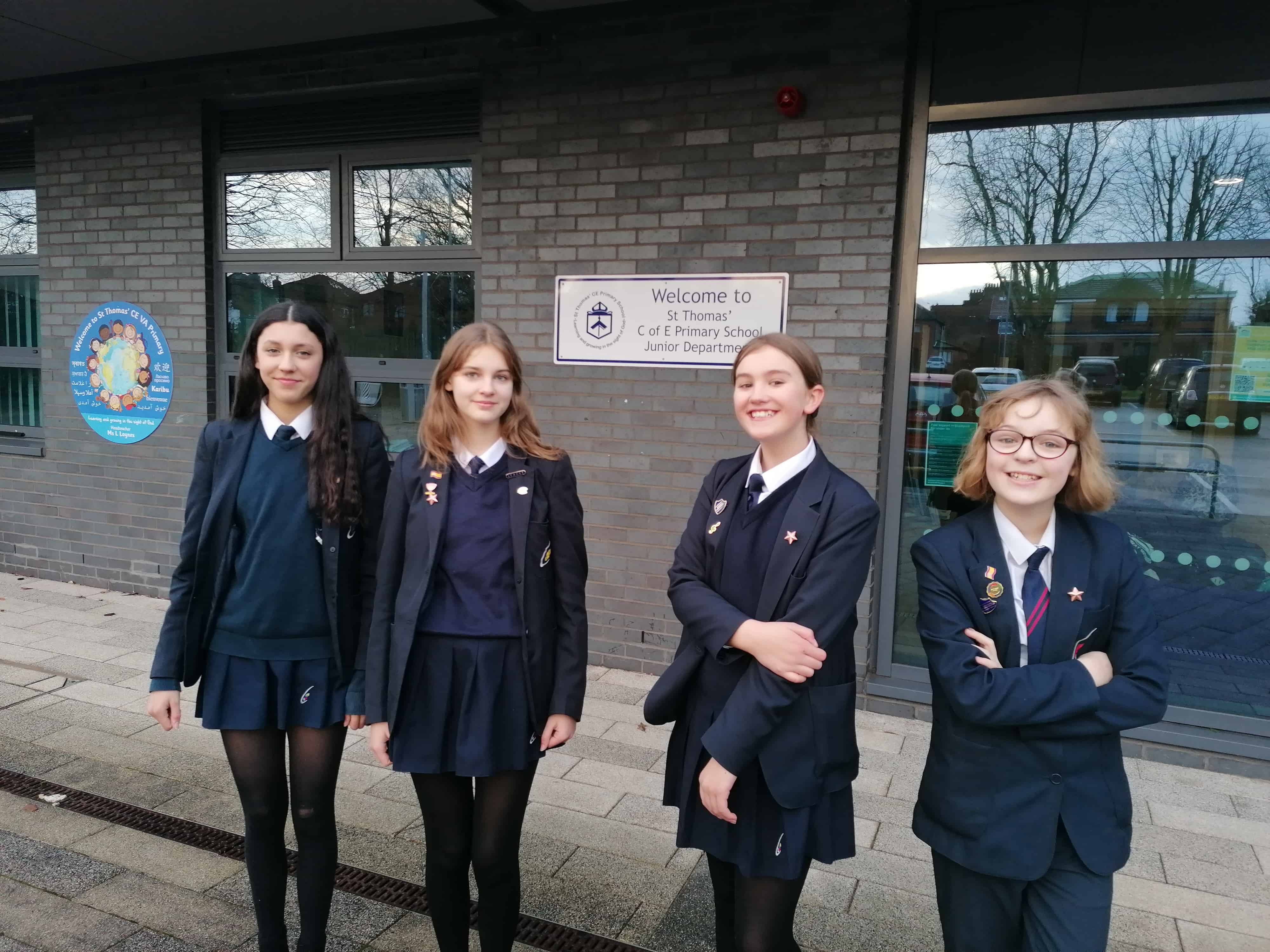 Languages ambassadors from Priestnall School stand outside of St Thomas' CE Primary School