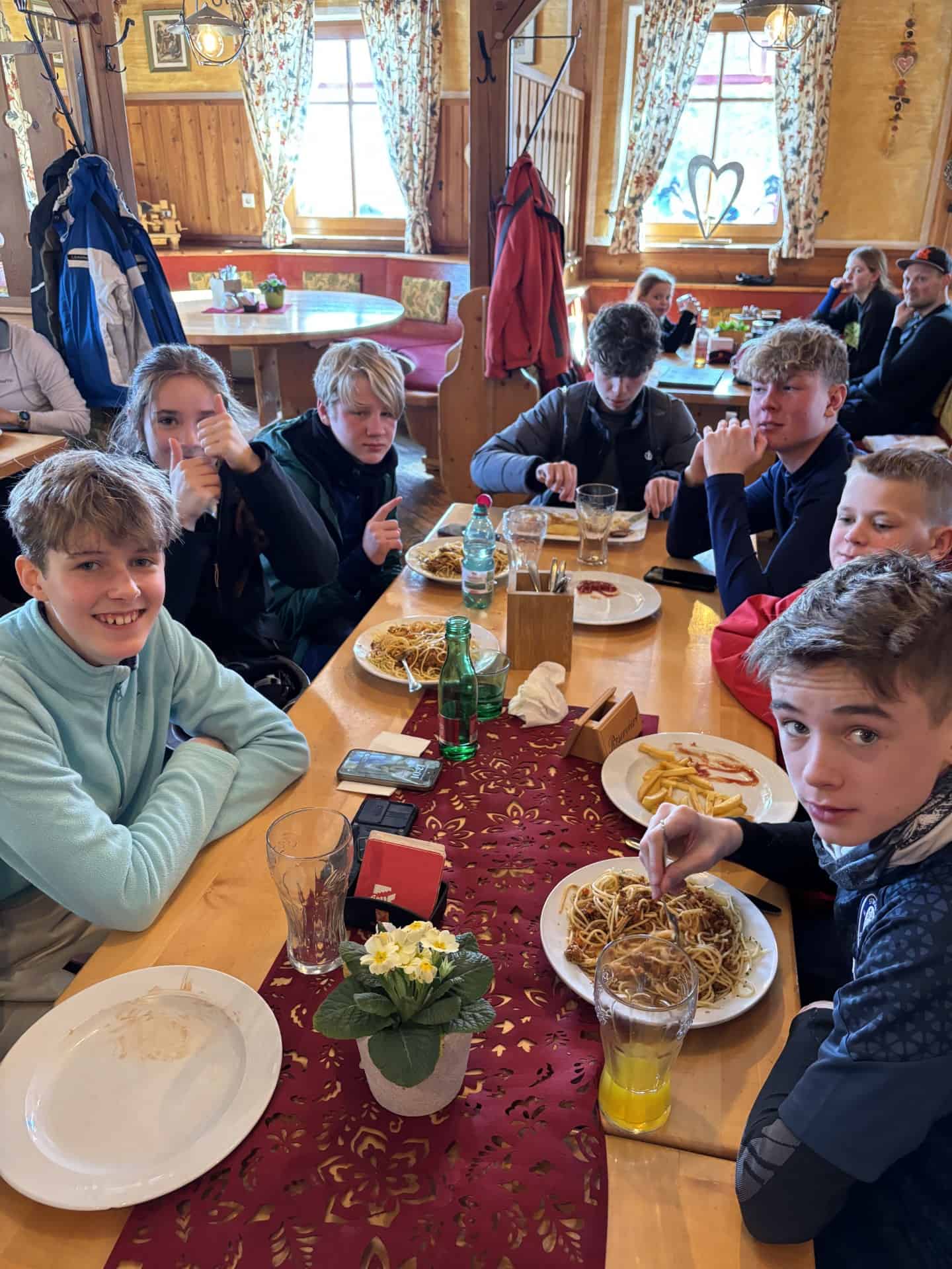 Students from Priestnall School have a meal at a restaurant in Austria.